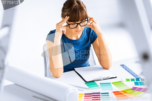 Image of stressed interior designer