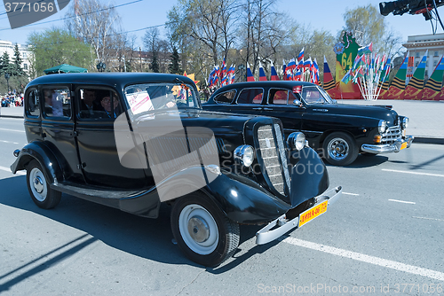 Image of Soviet luxury retro cars on parade. Tyumen. Russia