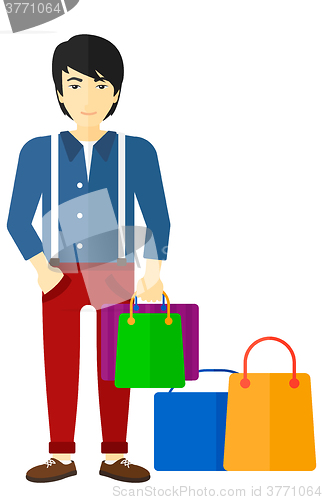 Image of Buyer with shopping bags.