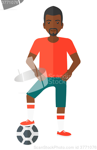 Image of Football player with ball.