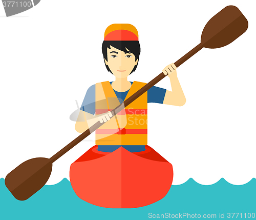 Image of Man riding in canoe.