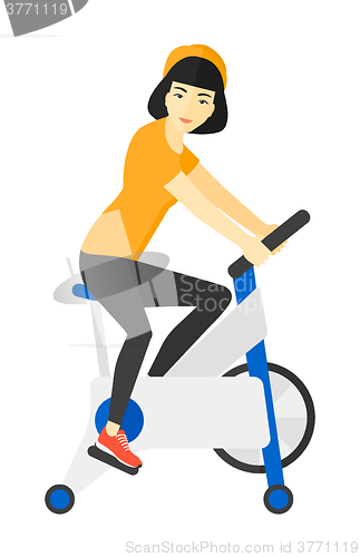 Image of Woman doing cycling exercise.