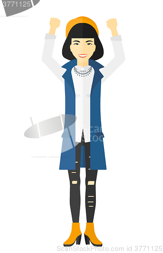 Image of Woman with raised hands up.
