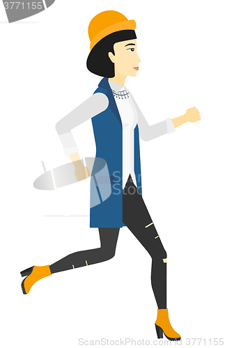 Image of Happy woman jogging.