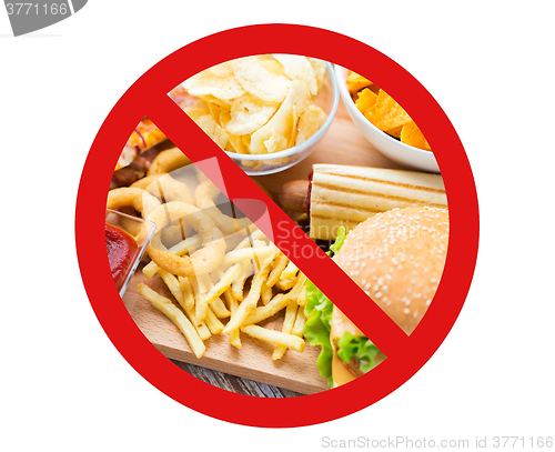 Image of close up of fast food snacks behind no symbol