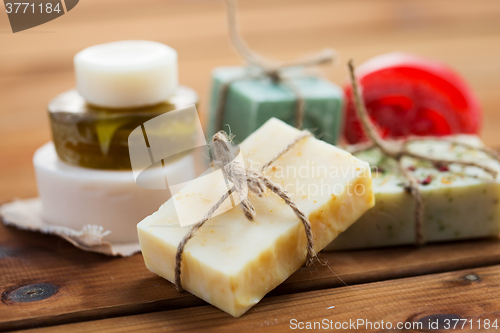 Image of close up of handmade soap bars on wood