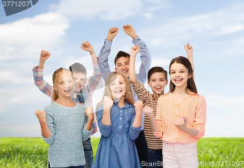 Image of happy children celebrating victory