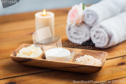 Image of close up of soap, himalayan salt and scrub in bowl