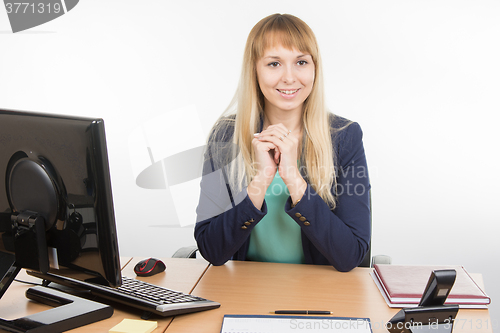 Image of Beautiful girl secretary meets visitor