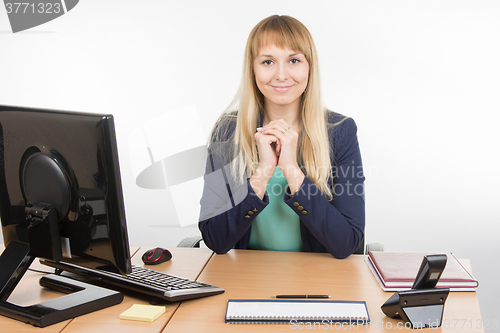 Image of Beautiful business woman at the desk