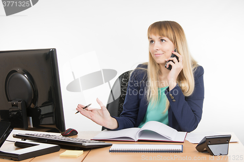 Image of Business woman finds the right information on the phone