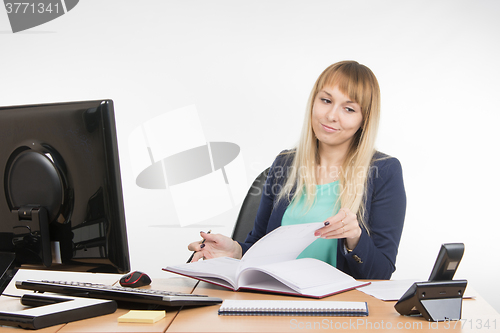 Image of Arrogant office a specialist sorting paper looked at the phone rang