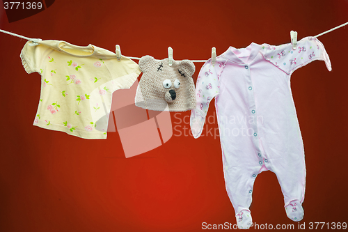 Image of Baby goods hanging on the clothesline