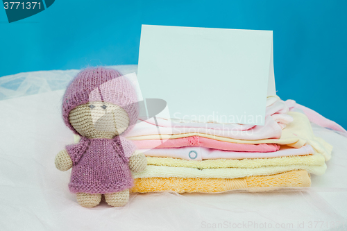 Image of The baby clothes with card