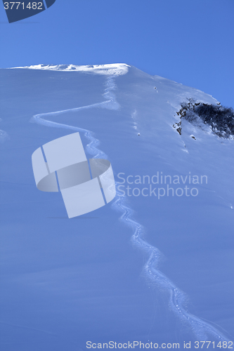 Image of Trace from ski on off-piste slope in early morning