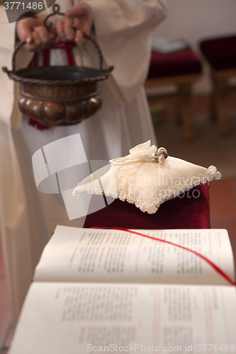 Image of Wedding rings in church