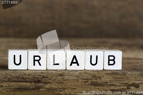 Image of The german word holidays written in cubes