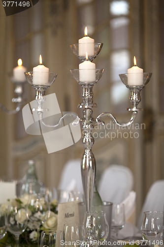 Image of Candles at a laid table