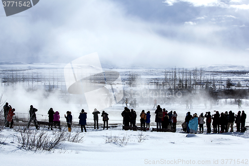 Image of Tourists at the famous geyser Strokkur, Iceland