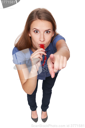 Image of Female blowing a whistle and pointing at you