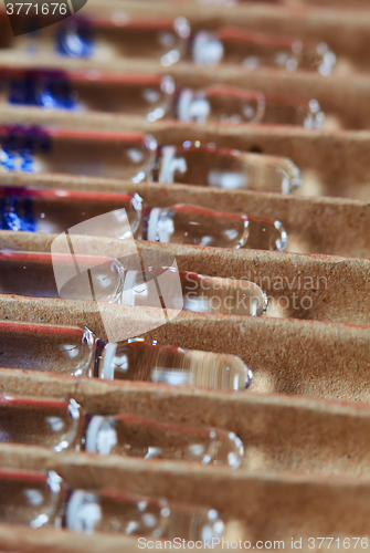 Image of Medical ampules on a red background, selective focus. 