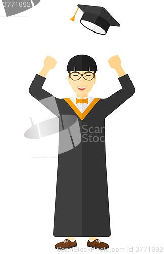Image of Graduate throwing up his hat.