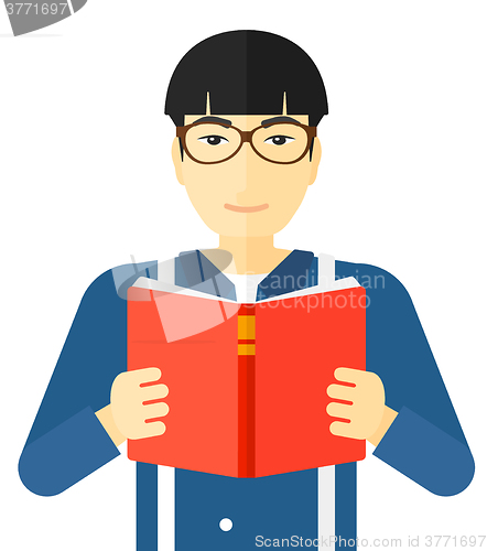 Image of Man reading book.