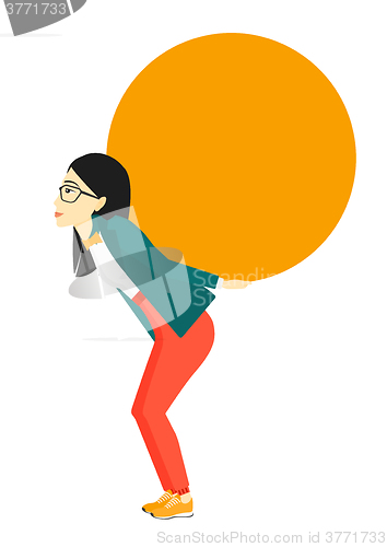 Image of Woman carrying big ball.