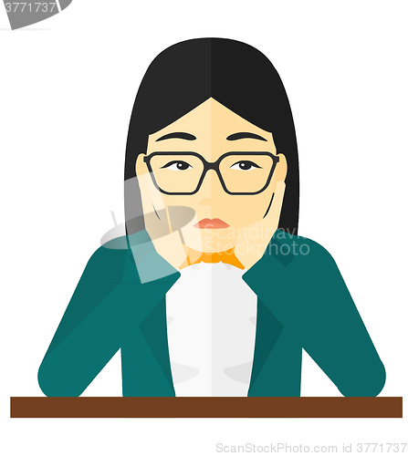 Image of Woman in despair clutching her head.