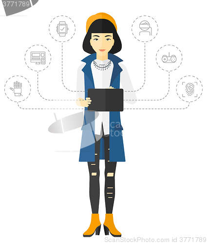 Image of Woman holding tablet computer.