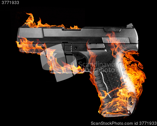 Image of burning black pistol