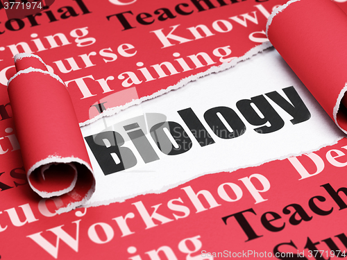Image of Learning concept: black text Biology under the piece of  torn paper