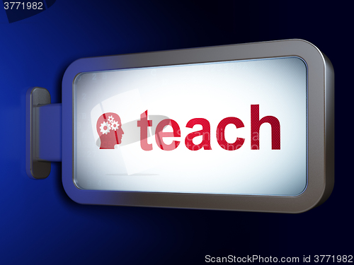 Image of Education concept: Teach and Head With Gears on billboard background