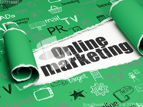 Image of Marketing concept: black text Online Marketing under the piece of  torn paper