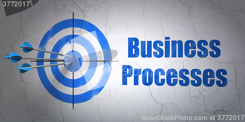 Image of Finance concept: target and Business Processes on wall background
