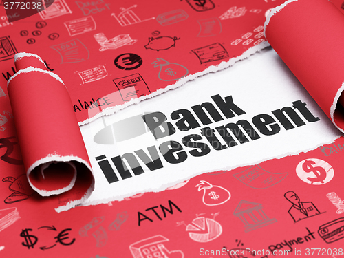 Image of Currency concept: black text Bank Investment under the piece of  torn paper