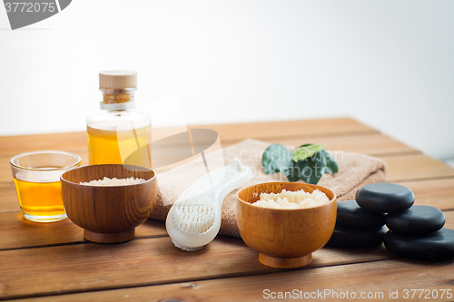 Image of close up of scrub, massage oil and bath stuff