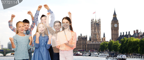 Image of happy children celebrating victory over london