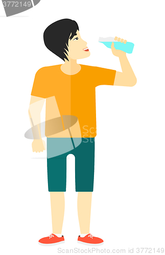 Image of Man drinking water.