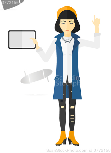 Image of Woman holding tablet computer.