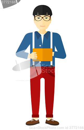 Image of Man using digital tablet.