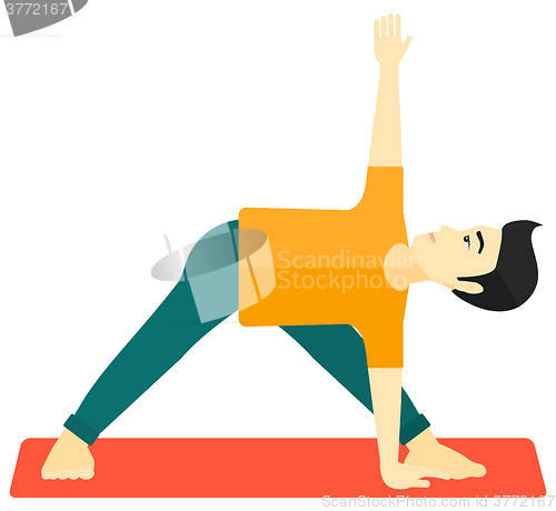 Image of Man practicing yoga.