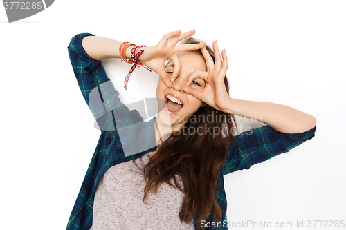 Image of happy teenage girl making face and having fun