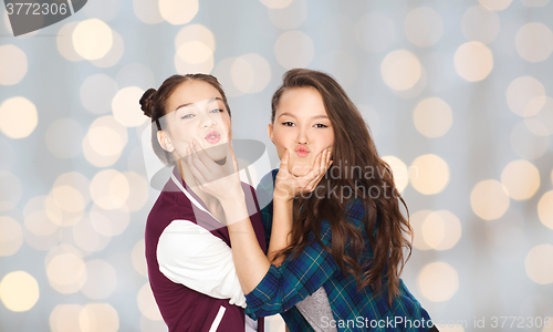 Image of happy smiling pretty teenage girls having fun