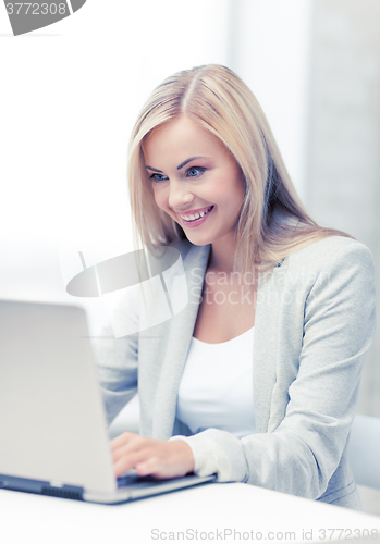 Image of businesswoman with laptop