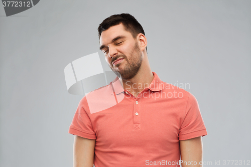 Image of man wrying over gray background