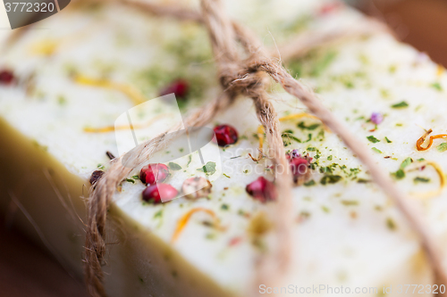 Image of close up of handmade soap bars on wood