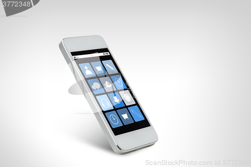 Image of white smarthphone with application icons on screen