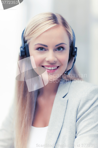 Image of friendly female helpline operator