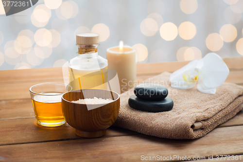 Image of close up of salt, massage oil and bath stuff